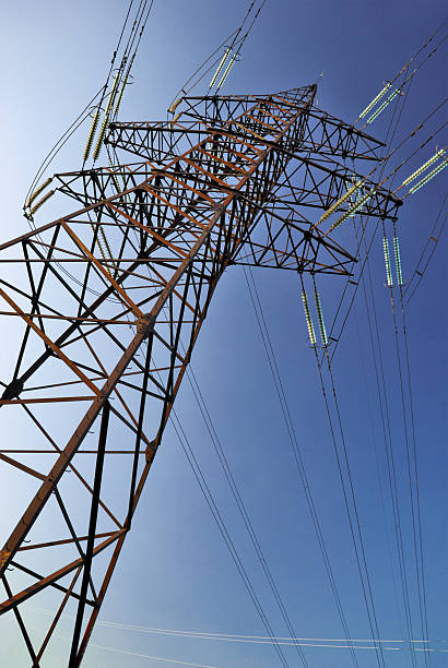 istock High voltage electrical Power lines against a blue sky 186809009