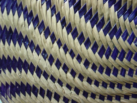 Closeup of a weave pattern for a handwoven fan. The fan used by the local people during warm weather.