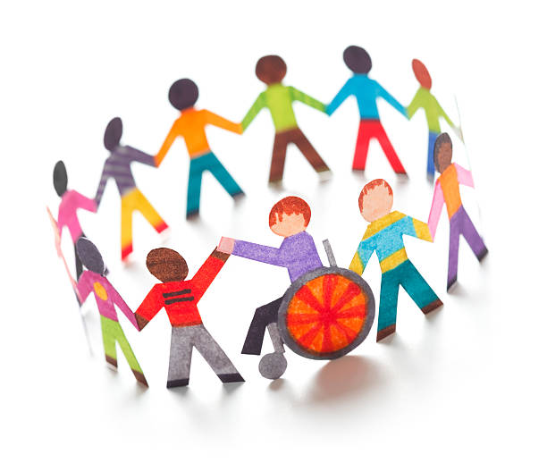 istock Ethnic circle with handicapped person - paper concept 186809231