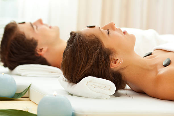 istock Couple Having Massage At Spa Center 186809640
