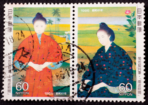 Two stamps showing geisha