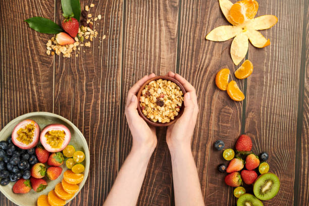istock Person Holding Granola Bowl 1868103110