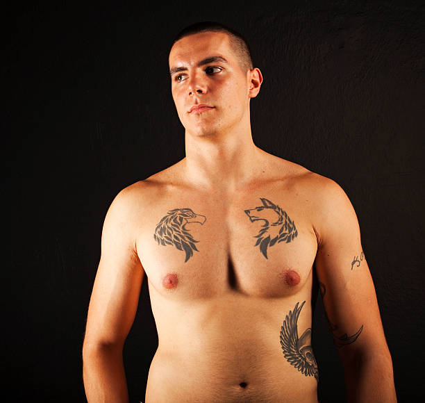 Attractive Male  chest tattoos for men designs stock pictures, royalty-free photos & images