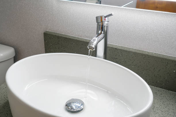 close up on modern ceramic sink in bathroom