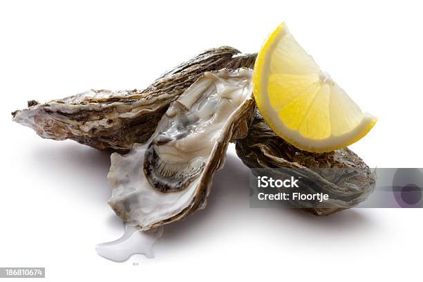 Seafood Oysters And Lemon Stock Photo - Download Image Now - Crustacean, Cut Out, Food