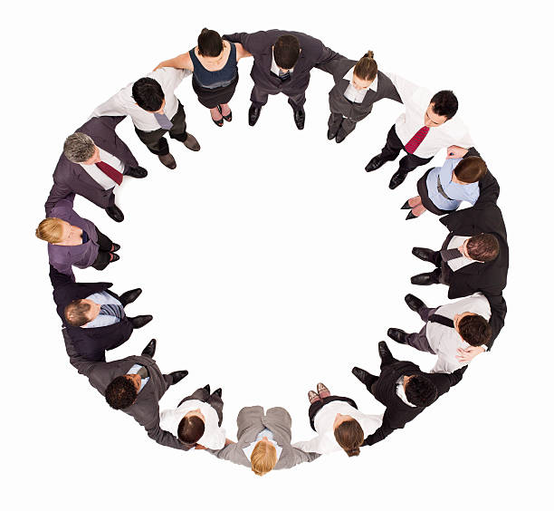 istock Businesspeople Embracing in a Circle - Isolated 186810725