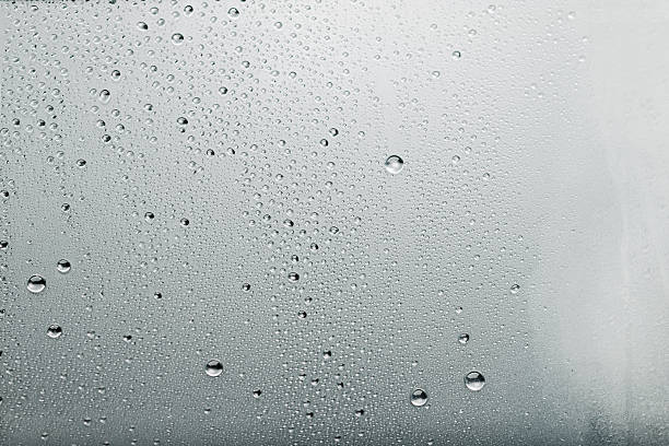 istock Water drops background Dew condensation texture on ice cold  glass 186811074