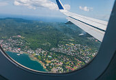 Landscape of tropical island from airplane window