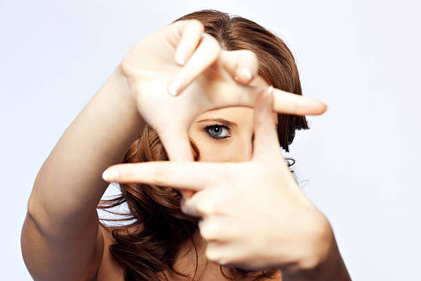 Woman making a frame with her fingers