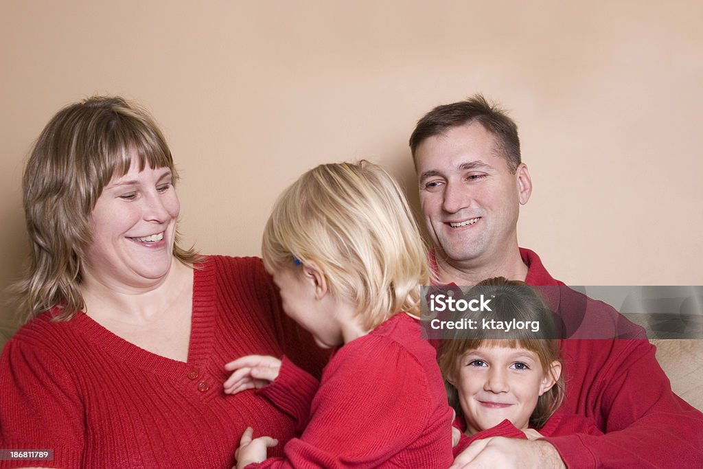 Family having fun together Parents having fun with their two daughters (shallow dof) 2-3 Years Stock Photo