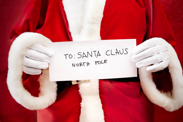 istock Santa showing letter 186811880