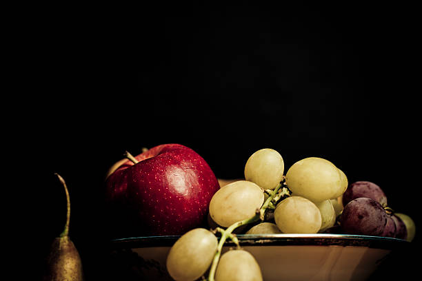 Apples, grapes and a pear stock photo