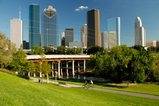 istock Houston, Texas Skyline, Bicyclists and Waterway 186812590