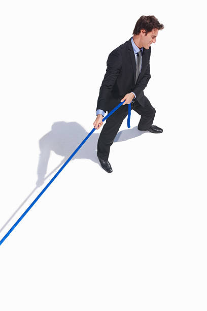 istock Business man struggling against the competition 186812629