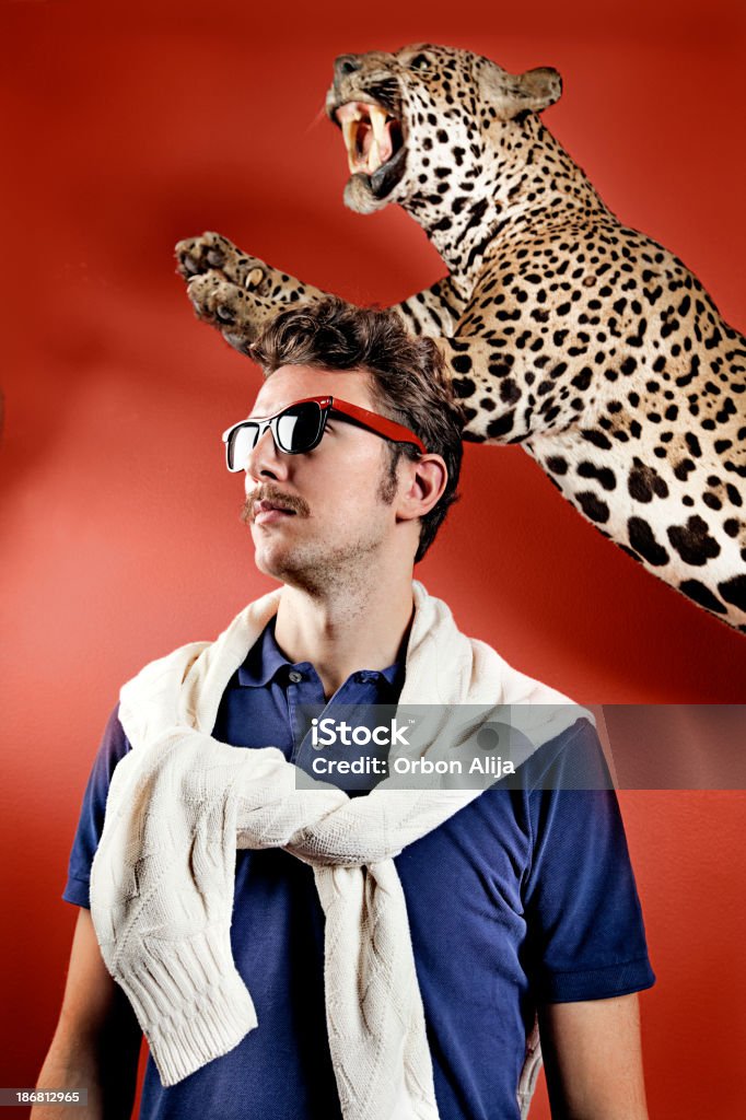 Posh man Posh man posing with jaguar Adult Stock Photo