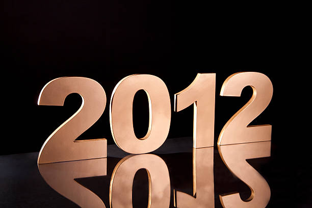 New Year Celebration Year 2012 on a black plexiglass background. january 2012 calendar stock pictures, royalty-free photos & images