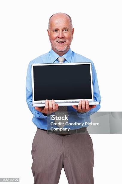 Senior Negócios Homem Segurando Seu Computador Portátil - Fotografias de stock e mais imagens de Adulto