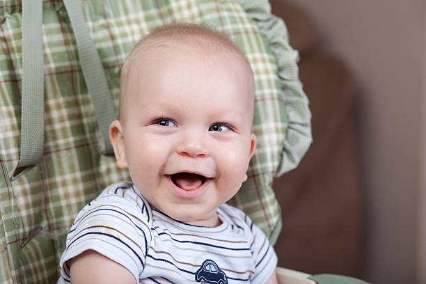 istock Happy baby portrait laughing candid smiling 186814157