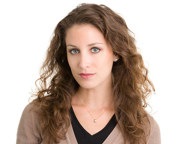 istock Serious Young Woman Headshot Portrait 186814406