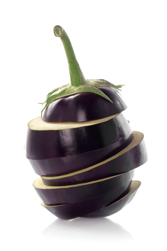 Eggplant slices on white background