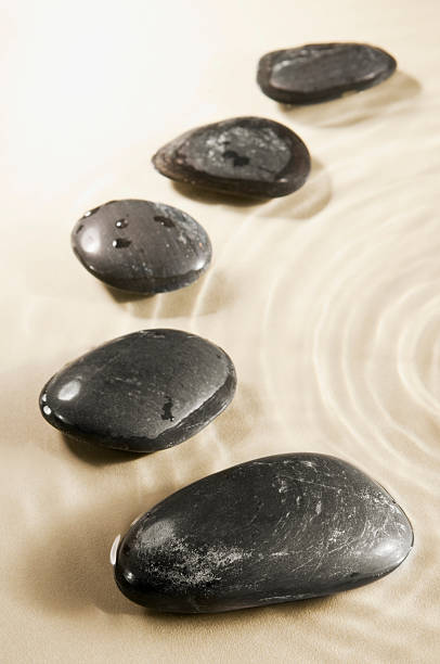 istock Stepping stones in water with emanating ripples 186815088