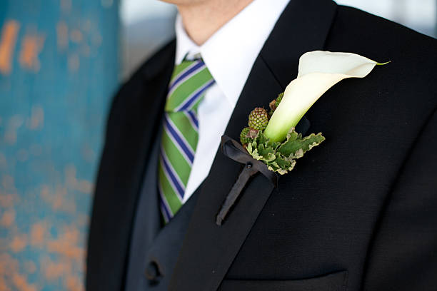 istock Groom with lily boutonniere 186815545