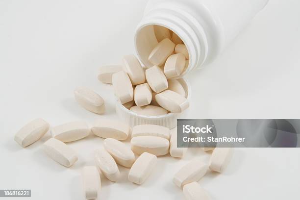Caplets With White Bottle Stock Photo - Download Image Now - Addiction, Beauty, Drug Abuse