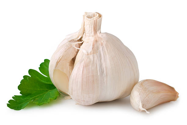 istock Unpeeled garlic cloves on white background 186816264