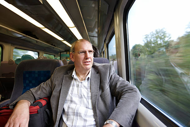 istock Mature caucasian man travelling by train 186817135