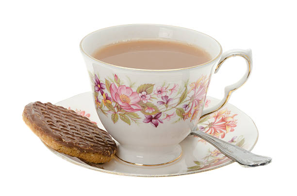 istock Cup of tea with a chocolate biscuit 186818108