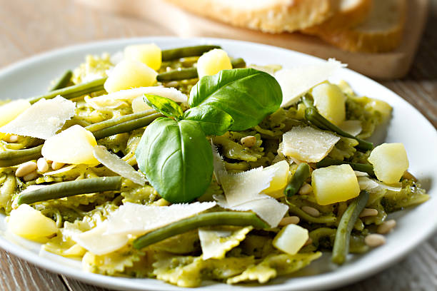 istock Pasta with pesto sauce 186818711