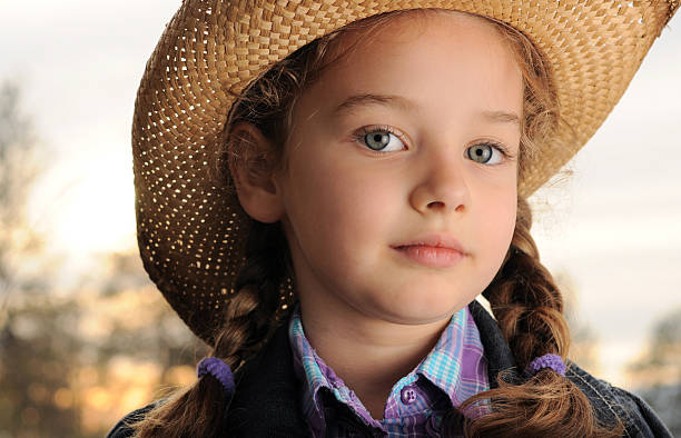 istock Young girl, cowboy hat 186819407