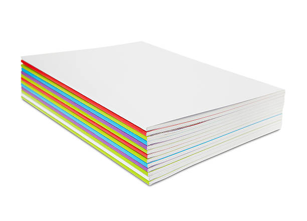 stack of colored and white blank magazines stock photo