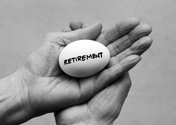 istock A woman holding an egg, showing how fragile retirement is 186819689