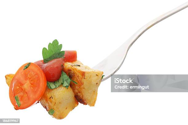 Baked Potato With Tomato And Ketchup On Fork Isolated Stock Photo - Download Image Now