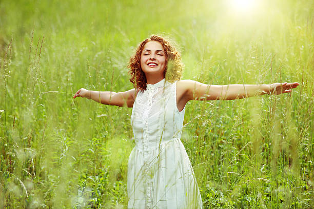istock Girl in a field 186820211