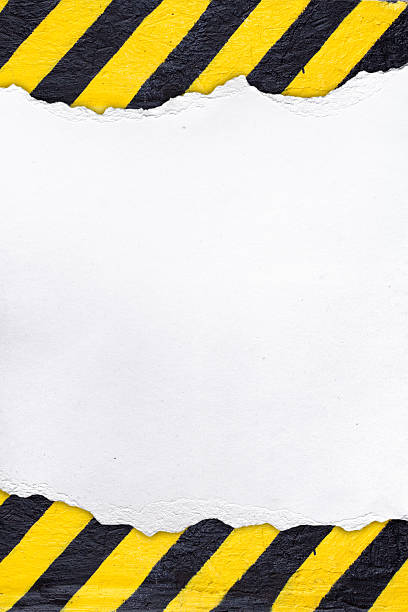 istock White background in yellow and black stripes. 186820620