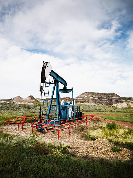 istock Black Gold Canada Oil Drilling Pumpjack 186820632
