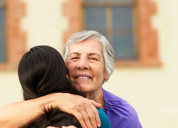 istock Young woman hugging her grandmother 186820719