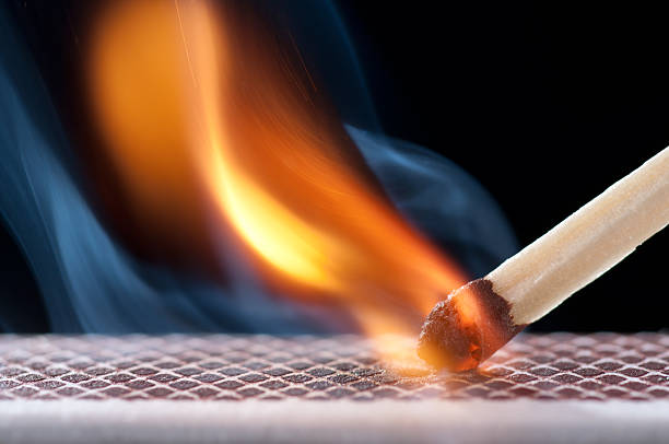 Matchsticks Matchsticks igniting into flame lit match stock pictures, royalty-free photos & images