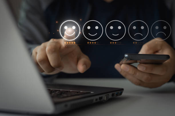 istock Customer service evaluation and client review satisfaction feedback survey concept. Business people touch happy smiley face on virtual screen to give satisfaction in service. rating very impressed. 1868211432