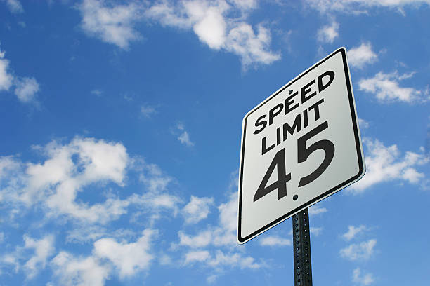 Speed Limit Sign 45 MPH speed limit sign against blue sky speed limit sign stock pictures, royalty-free photos & images