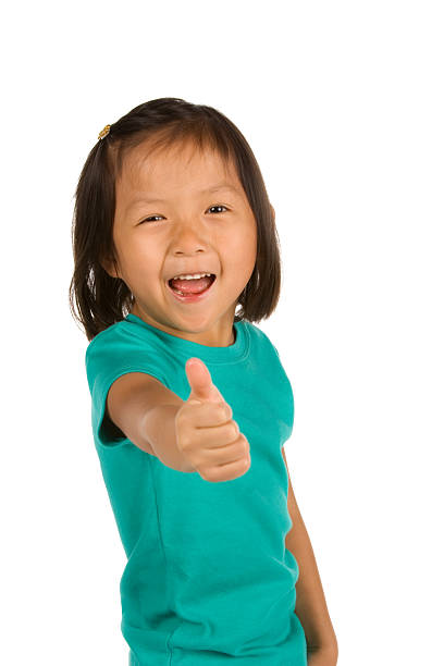 istock Girl in tshirt giving thumb's up 186821500