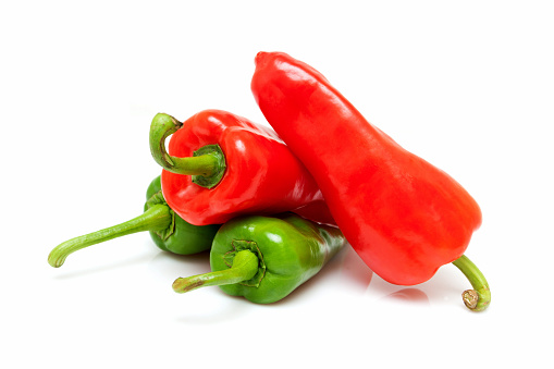 Vegetable: Red peppers and green peppers isolated on white background.