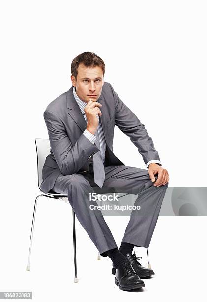 Businessmann Mit Einem Nachdenklichen Stimmung Stockfoto und mehr Bilder von Anzug - Anzug, Sitzen, Stuhl