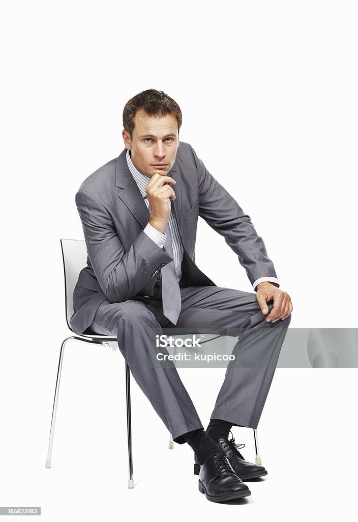 Un hombre de negocios en un estado de ánimo Pensativo - Foto de stock de Sentado libre de derechos