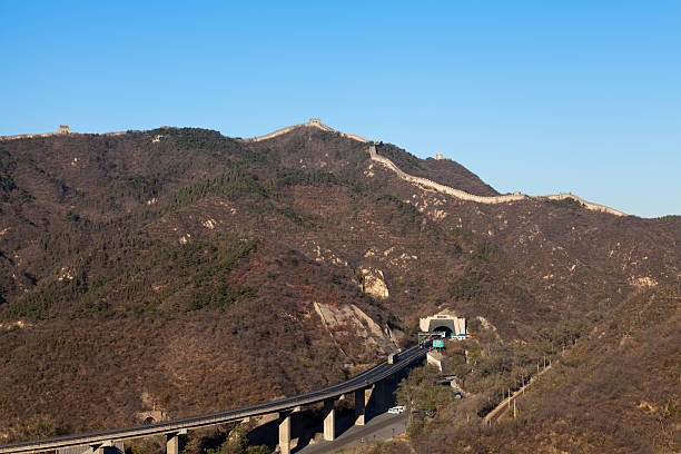 istock Highway tunnel through the mountains with Badaling Great Wall 186823225