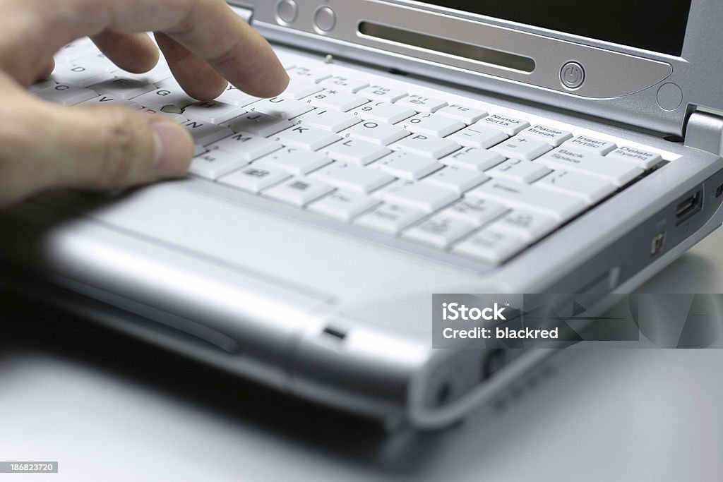 Access Close up of a hand typing on laptop keyboard.Similar images - Close-up Stock Photo