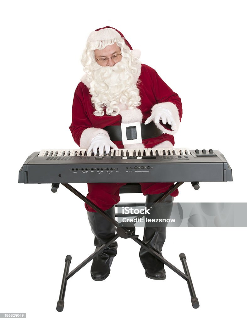 Santa Claus Playing a Keyboard - Music Series Santa Claus playing a keyboard.  Isolated on white.Click below to see a lightbox of all my Santa images: Arts Culture and Entertainment Stock Photo