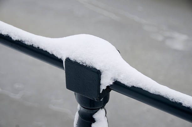 istock Railing with snow and ice diagonally 186824883